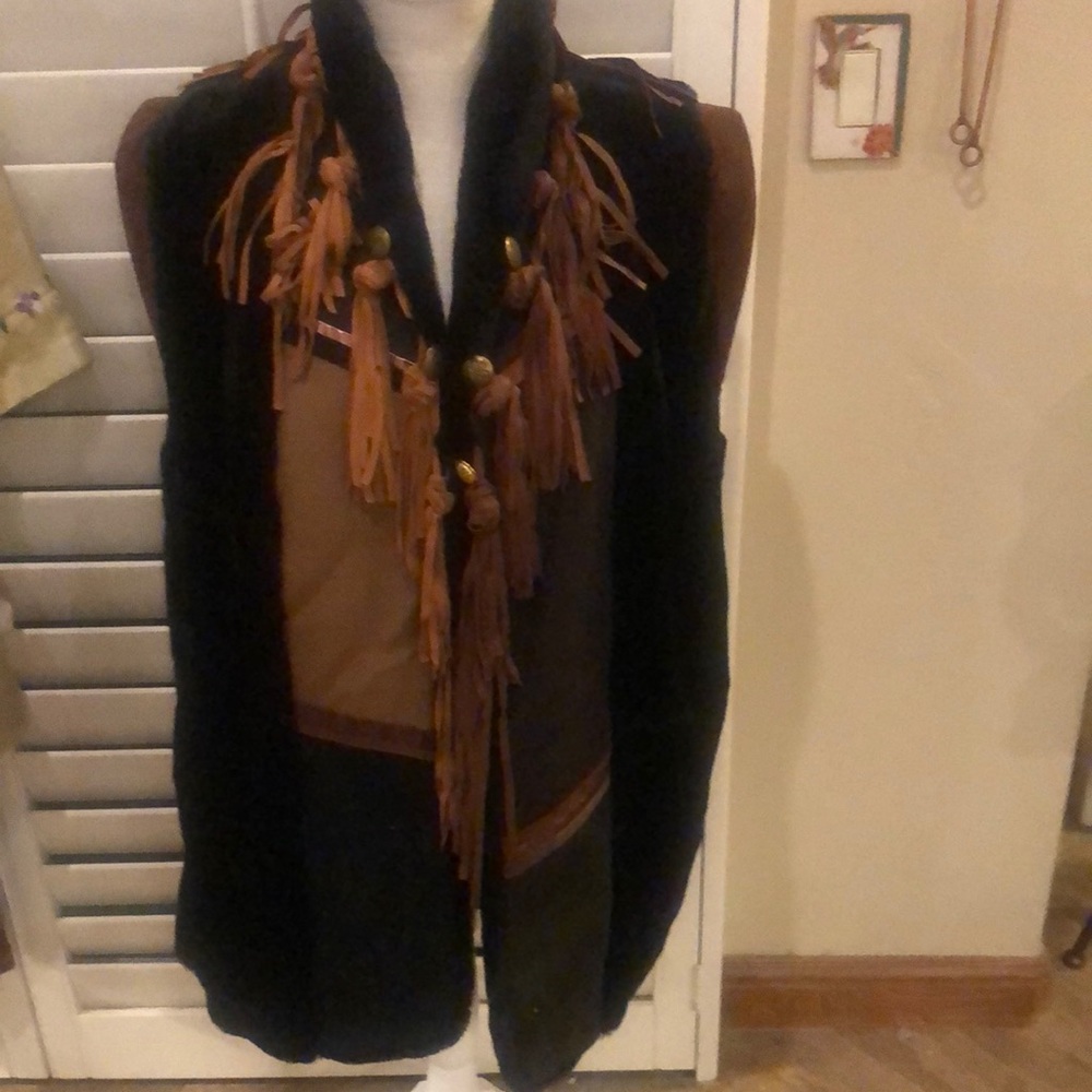 Southwest style. Faux fur long vest/duster. Leather trim. Fully lined. Unique!!